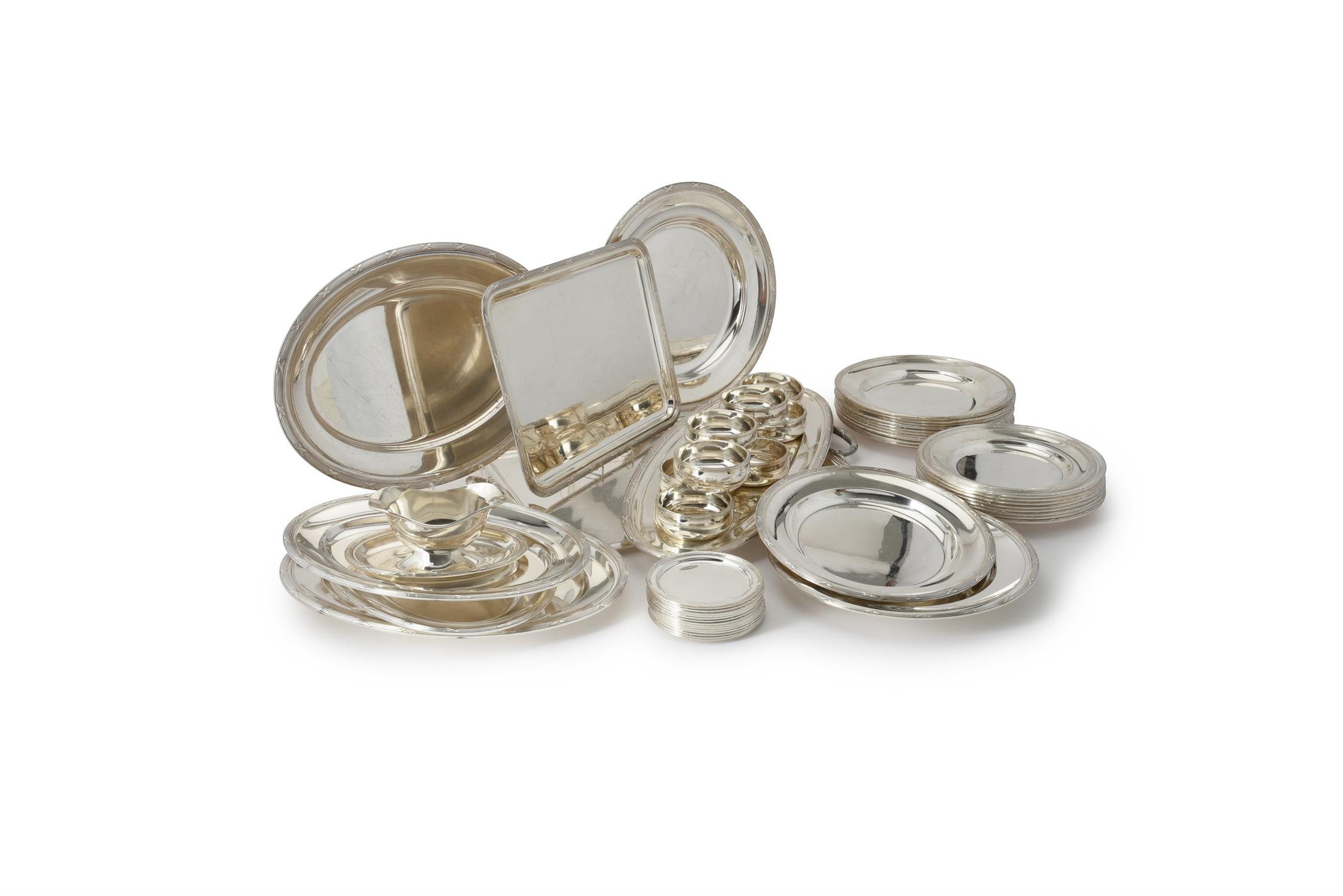A French electro-plated part table service of plates, serving platters and trays
