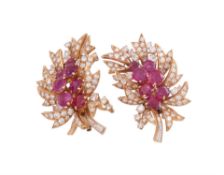 A pair of ruby and diamond foliate ear clips