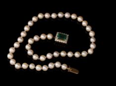 An emerald, diamond and cultured pearl necklace retailed by Boucheron