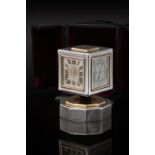 Cartier, a silver, gold and onyx mounted desk clock, perpetual calendar and weather station