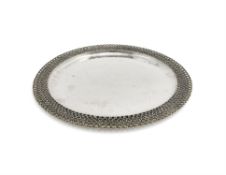 A silver parcel gilt circular salver by Stuart Devlin