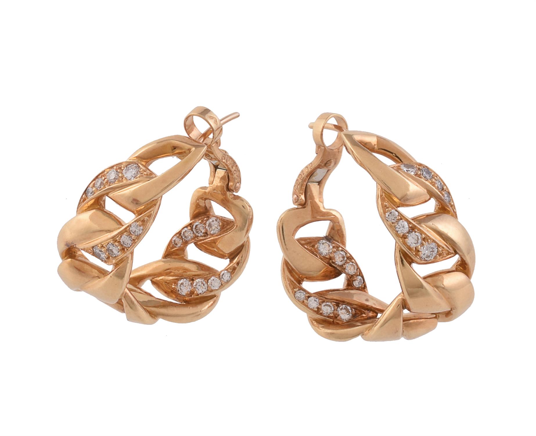 A pair of hoop earrings by Cartier