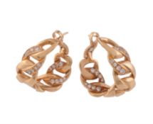 A pair of hoop earrings by Cartier