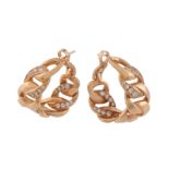 A pair of hoop earrings by Cartier