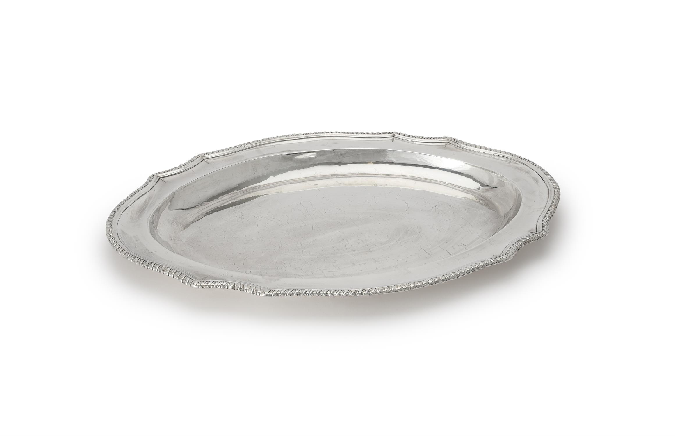 A George III silver shaped oval meat dish by John Houle