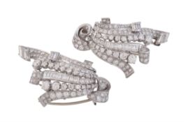 A pair of mid 20th century diamond scrolled clips