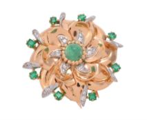 A 1950s French emerald and diamond flower head brooch