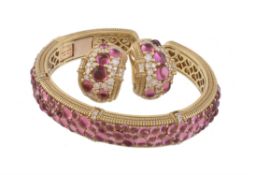 A pink tourmaline and diamond bangle and earrings by Judith Ripka