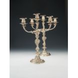 A pair of Victorian silver three light candelabra by Robert Garrard II