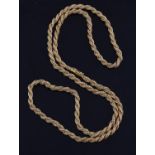 A gold coloured long chain by Bulgari