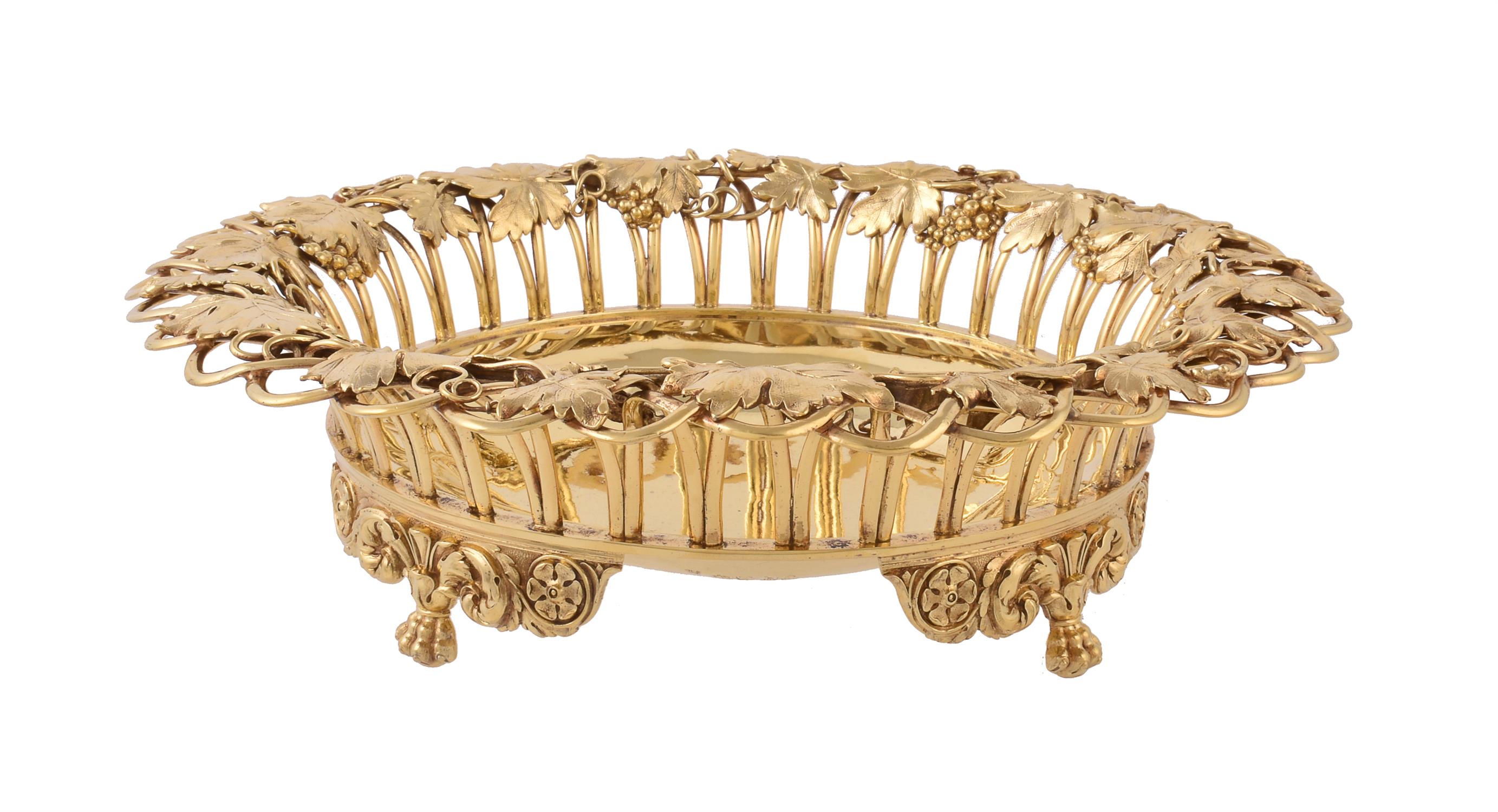 A George IV silver gilt circular dessert basket by William Eley & William Fearn