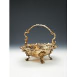 A late George III silver gilt shaped oval bread basket by J. E. Terrey & Co.