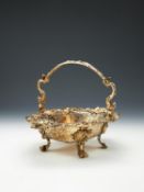 A late George III silver gilt shaped oval bread basket by J. E. Terrey & Co.