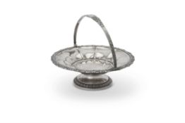 A George IV silver shaped circular pedestal basket by Joseph Craddock