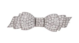 A 1930s diamond bow brooch