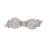 A 1930s diamond bow brooch