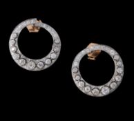 A pair of 1920s diamond crescent earrings