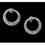 A pair of 1920s diamond crescent earrings