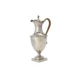 A George III silver vase shape ewer by Thomas Evans