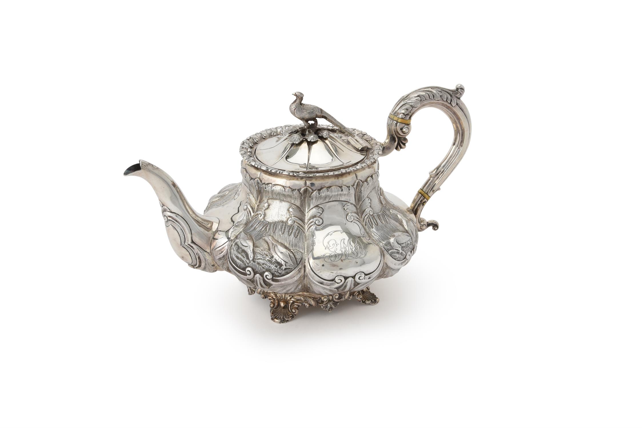 Y [Country shooting interest] An early Victorian silver lobed baluster tea pot by William Hunter