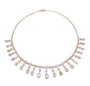 An Edwardian pink tourmaline, aquamarine and peridot gold necklace