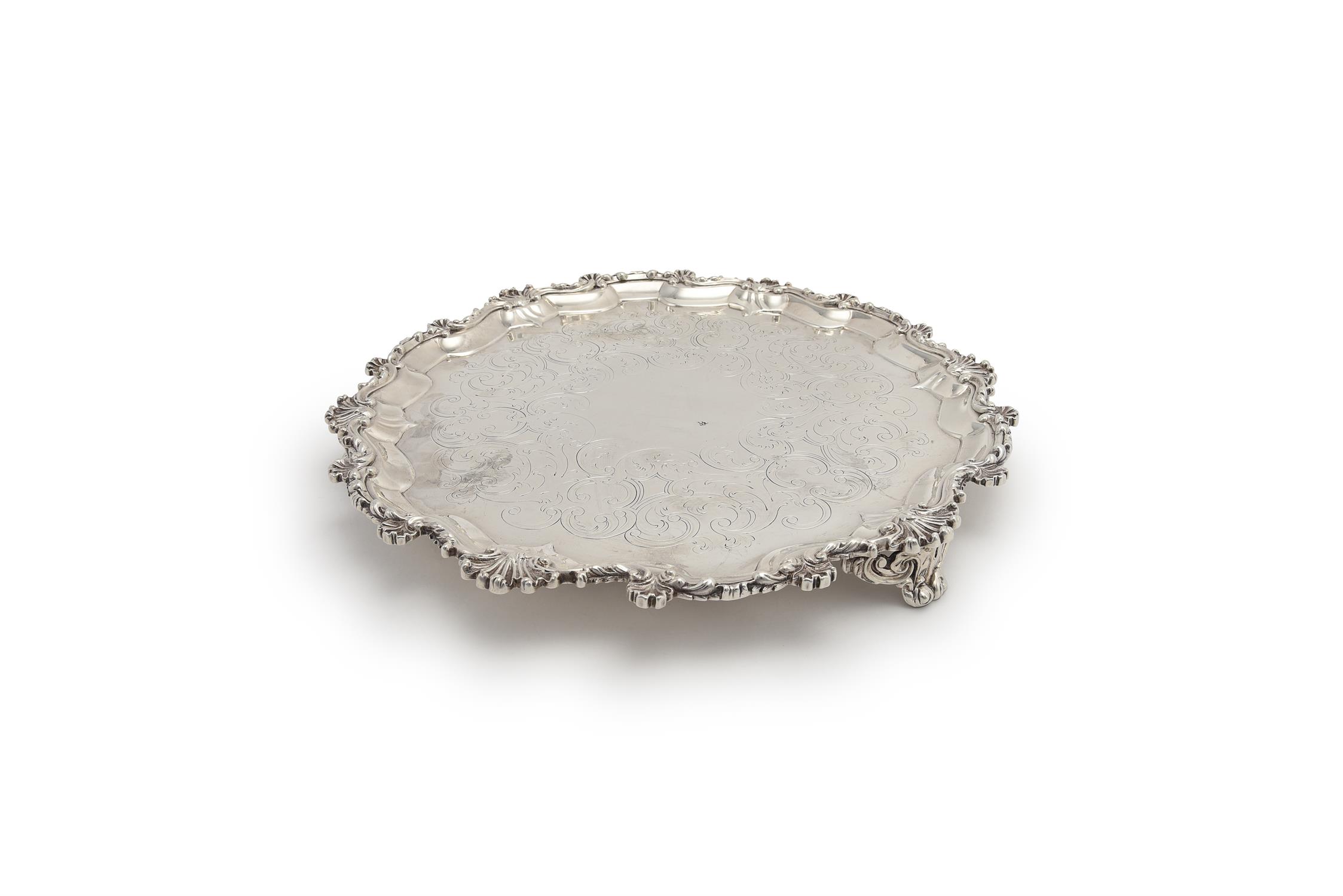 A Victorian silver shaped circular salver by Samuel Hayne & Dudley Cater