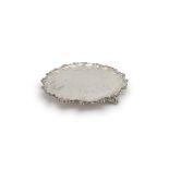 A Victorian silver shaped circular salver by Samuel Hayne & Dudley Cater