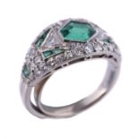An Art Deco emerald and diamond dress ring