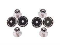 An 18 carat white gold, diamond and onyx dress set by Asprey