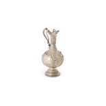 Y An Edwardian silver Armada pattern claret jug by Martin