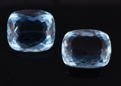 † Two unmounted cushion cut aquamarines