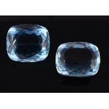 † Two unmounted cushion cut aquamarines