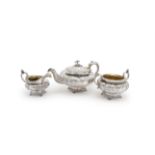 Y A William IV silver lobed circular three piece tea service