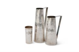 A graduated pair of Italian silver coloured straight tapered water jugs by Brandimarte