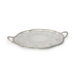 A Victorian silver shaped oval twin handled tray by Thomas Bradbury & Sons