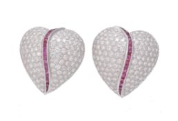 A pair of ruby and diamond heart shaped ear clips