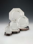 A modern Italian silver coloured octagonal table service of plates by Bruno e Cesare Zaramella e Fig