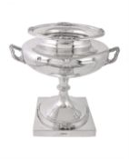 A silver twin handled trophy cup by Walker & Hall