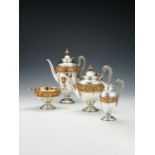 Y A matched Victorian silver parcel gilt vase shaped four piece tea and coffee service