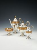 Y A matched Victorian silver parcel gilt vase shaped four piece tea and coffee service