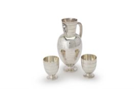 A Victorian silver ewer and footed goblets by Martin