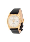 † Rolex, Oyster Perpetual Day Date, ref. 1803, a gold coloured wrist watch