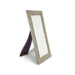 An Edwardian silver large rectangular wall or easel dressing mirror by A. & J. Zimmerman