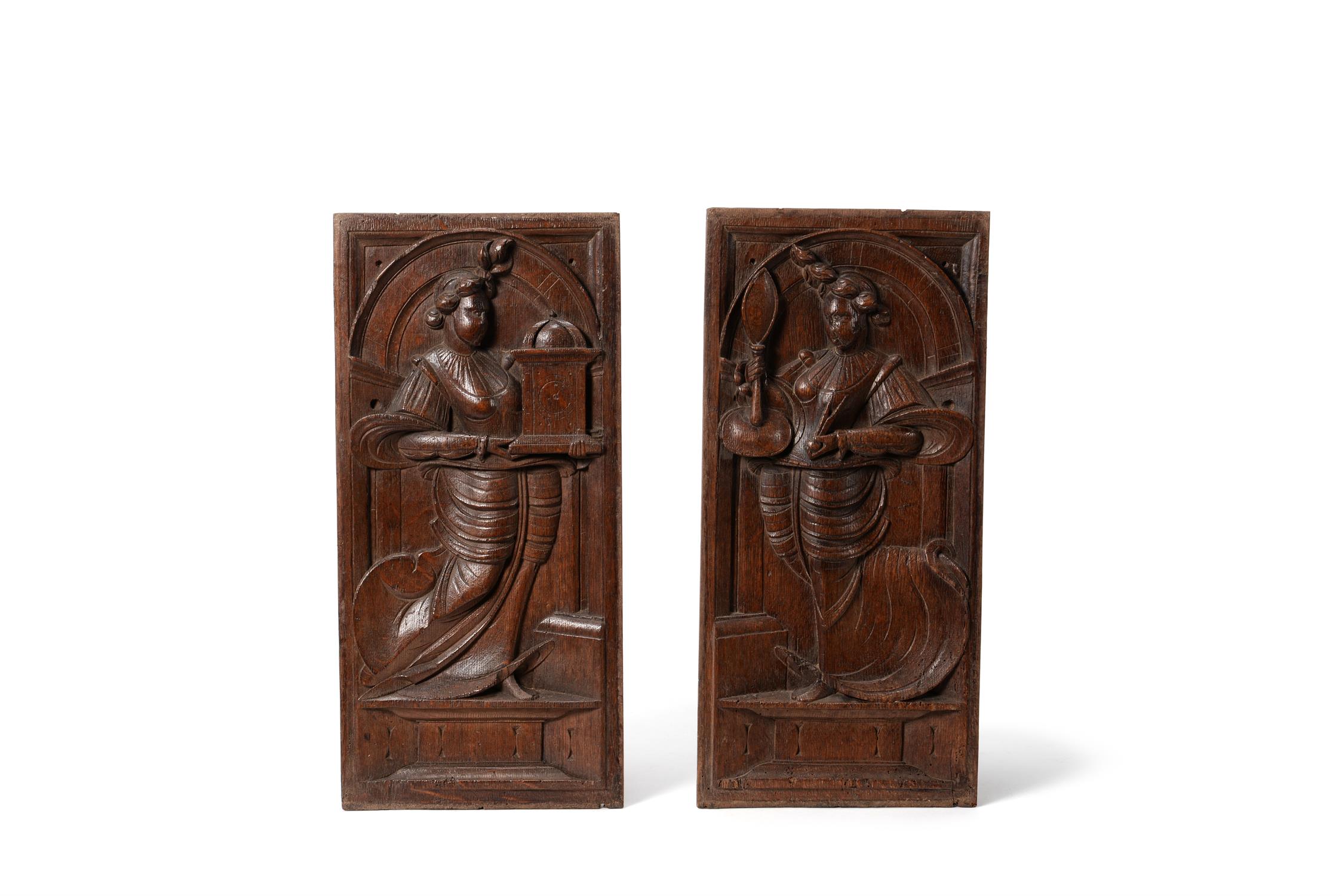 A pair of Flemish sculpted oak allegorical panels