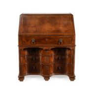 A George II walnut and feather banded bureau