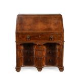 A George II walnut and feather banded bureau