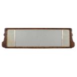 A George II walnut and parcel gilt wall mirror