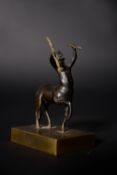 A French parcel gilt and patinated bronze model of a centaur