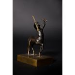 A French parcel gilt and patinated bronze model of a centaur