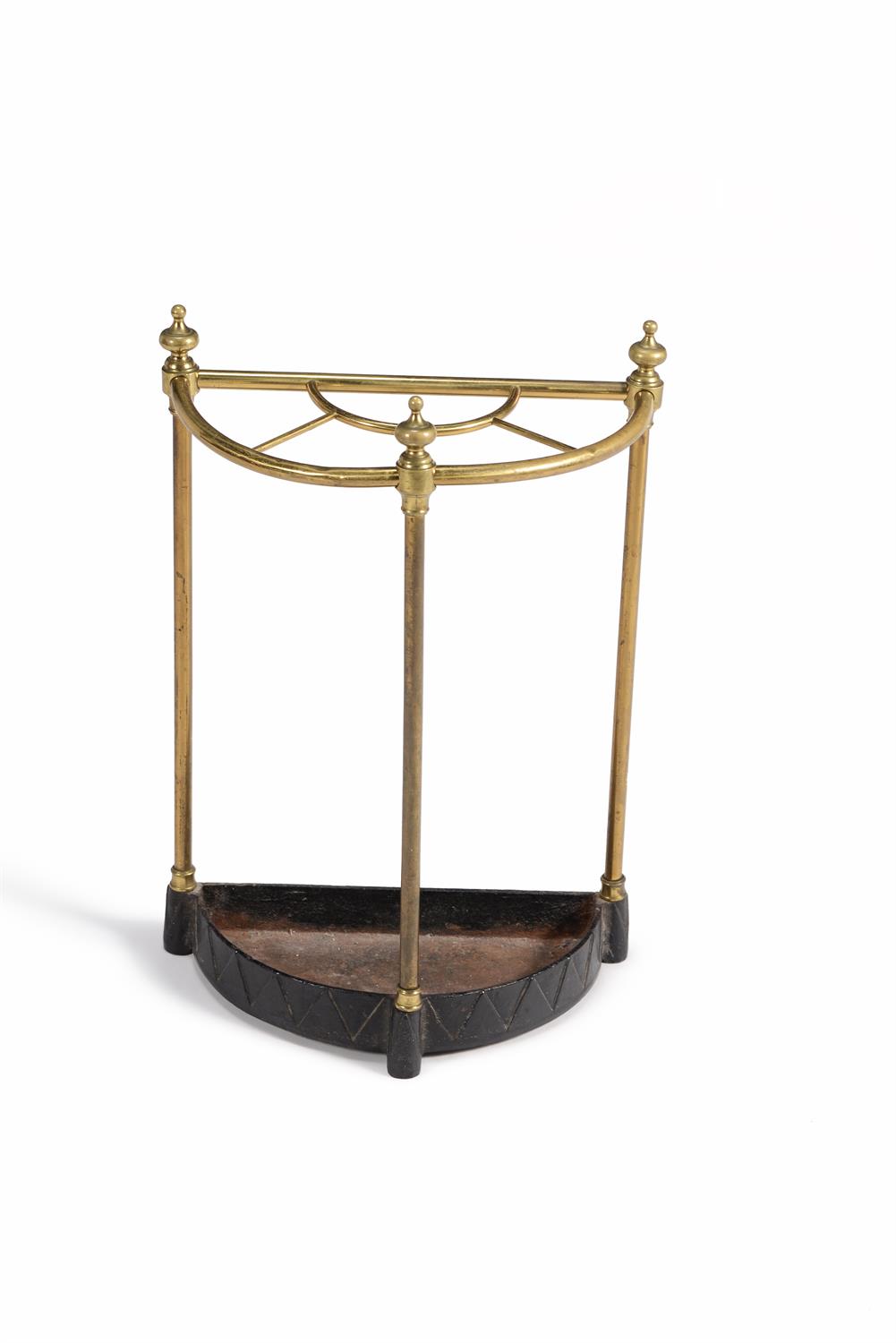 A Victorian brass and cast iron stick stand